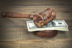 Alimony payment-gavel on money